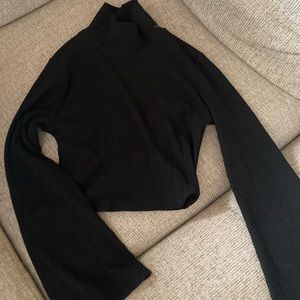 Black bell sleeve crop in size small from Forever 21.